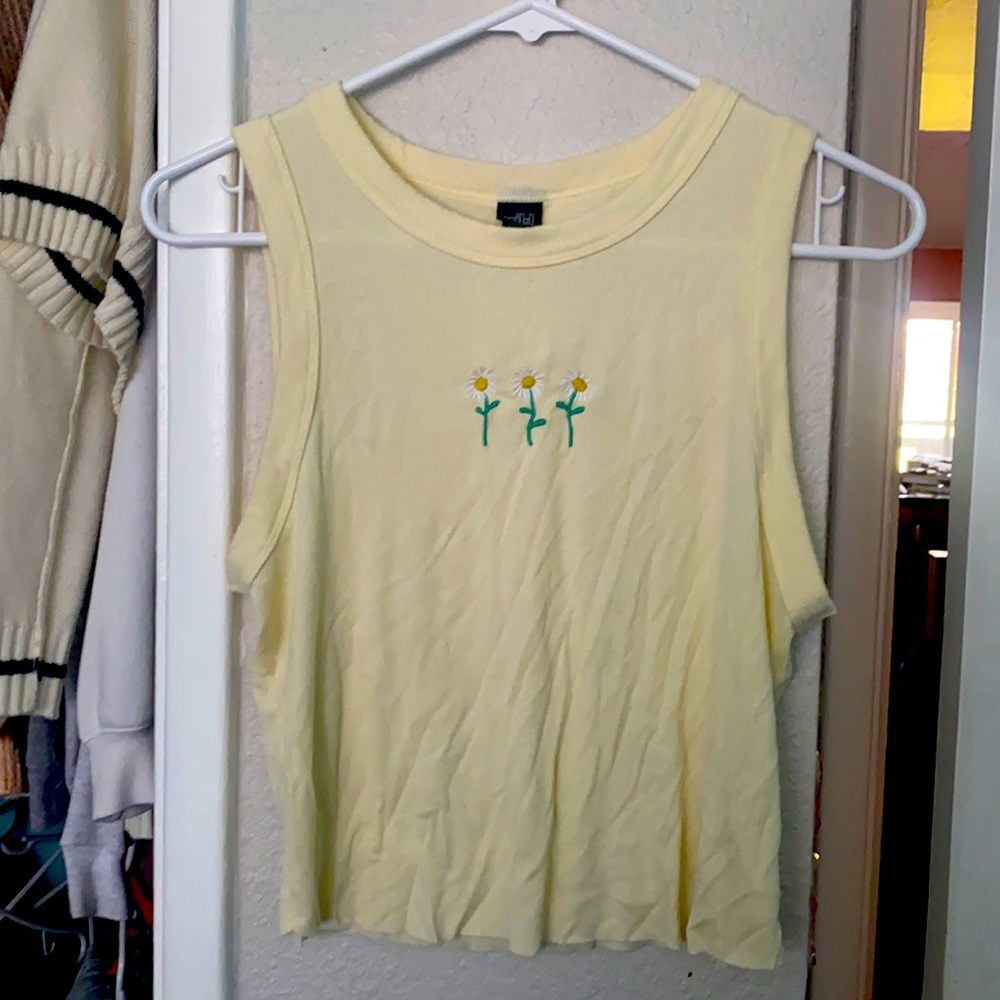 Sleeveless yellow shirt